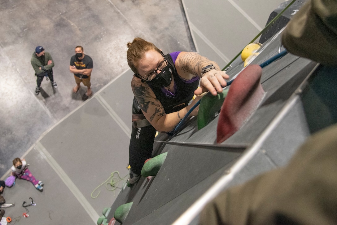 Wounded, ill and injured service members and veterans participate in a rock climbing class at Sport Rock in Alexandria, Virginia on January 23, 2022.