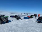 Some of the 18 people rescued from an ice floe in Lake Erie await their turn to ride ashore in an airboat Sunday, Feb. 6, 2022. The anglers were spotted by an aircrew from Air Station Detroit and rescued by the helicopter, an airboat from Coast Guard Station Marblehead, Ohio, and a good Samaritan. U.S. Coast Guard photo by Petty Officer 2nd Class Robert Morse.
