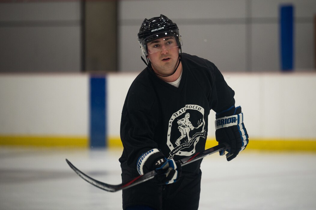 U.S. Air Force Special Agent Jack Taylor, an Office of Special Investigations Detachment 632 investigator, trains for an ice hockey game on Fort Wainwright, Alaska, Feb. 2, 2022.
