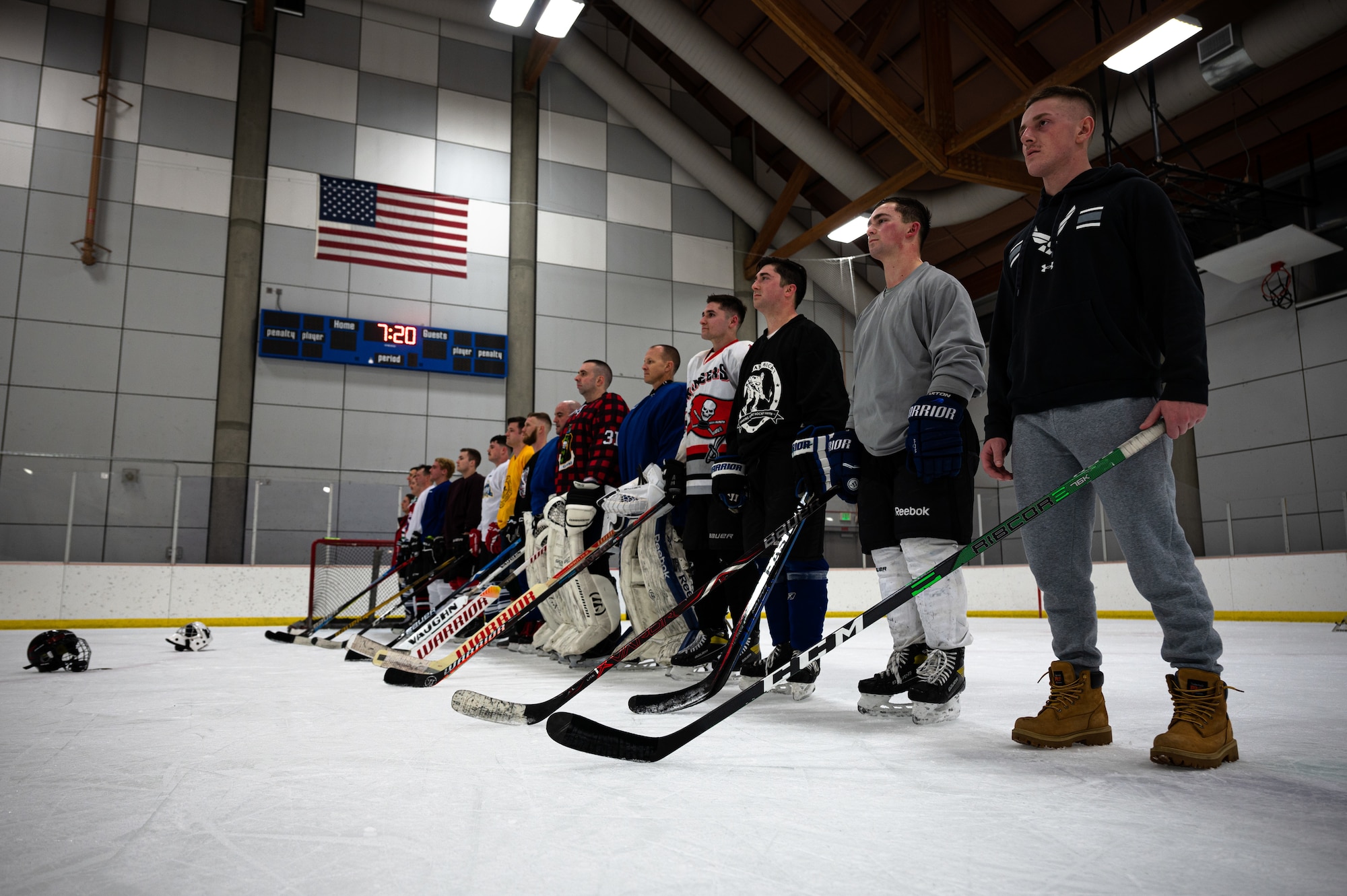 Members of the Eielson Hockey Team pose for a group photo on Fort Wainwright, Alaska, Feb. 2, 2022.