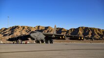 A Minot Air Force Base 5th Bomb Wing B-52H Stratofortress parked on the runway during Red Flag-Nellis 22-1 on Jan. 25, 2022, at Nellis Air Force Base, Nevada. Red Flag-Nellis 22-1 provides realistic combat training that saves lives by increasing combat effectiveness. (U.S. Air Force photo by Senior Airman Michael A. Richmond)