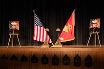 A memorial in honor of U.S. Marine Corps Lance Cpl. Jonathan E. Gierke and Pfc. Zachary W. Riffle is presented during the unit memorial service in honor of the fallen Marines on Camp Lejeune, North Carolina, Feb. 9, 2022. The battalion held the memorial service at the Camp Lejeune Base Theater to honor the memories of Lance Cpl. Jonathan E. Gierke and Pfc. Zachary W. Riffle. (U.S. Marine Corps photo by Lance Cpl. Jessica J. Mazzamuto)