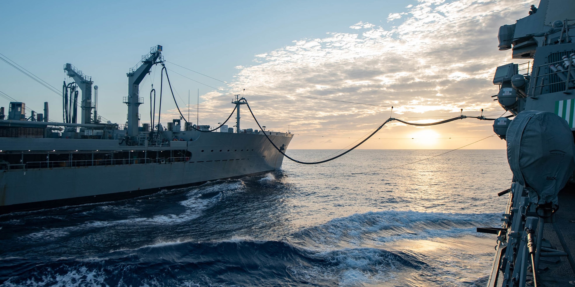 Arleigh Burke-class guided-missile destroyer USS Spruance (DDG 111) conducts replenishment-at-sea with fleet replenishment oiler USNS Guadalupe (T-AO 200).