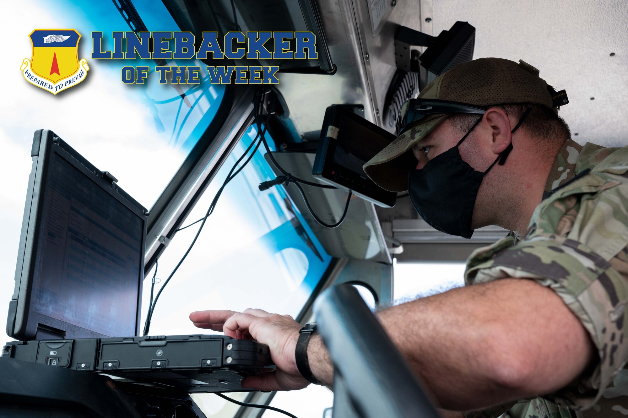 U.S. Air Force Staff Sgt. Kyle Mangold, the noncommissioned officer in charge of radio operations with the 36th Communications Squadron, programs a system at Andersen Air Force Base, Guam, Feb. 3, 2022.