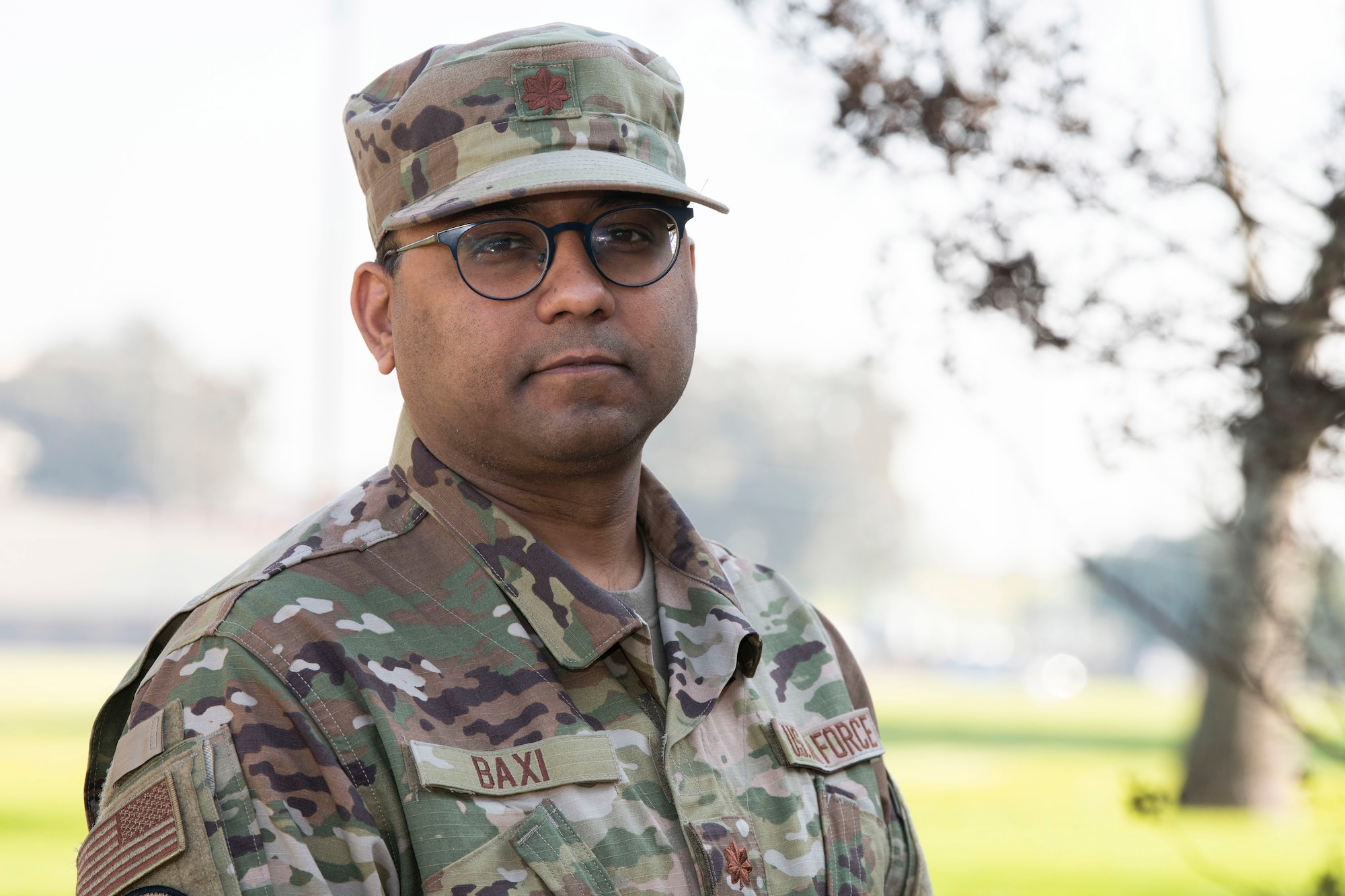 Maj. (Dr.) Sanjiv Baxi, a physician with the 349th Medical Squadron at Travis Air Force Base, California, poses for a photo prior to departing on a mission supporting COVID-19 relief in New York, Feb. 4, 2022 (U.S. Air Force photo by Grant Okubo)