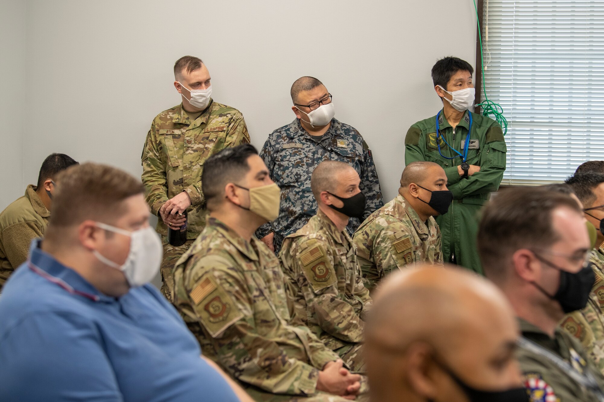 Airmen from 5th Air Force, U.S. Forces Japan, and Japan Air Self Defense Force attend a virtual all-call with Air Force Chief of Staff Gen. CQ Brown, Jr., and Chief Master Sgt. of the Air Force JoAnne S. Bass Feb. 8, 2022, at Yokota Air Base, Japan. The all-call was open to 5th Air Force members across Japan. (U.S. Air Force photo by Senior Airman Brieana E. Bolfing)