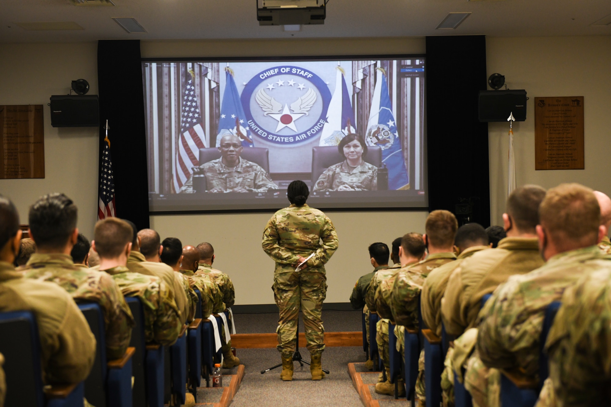 Master Sgt. Quintina Tatum, 374th Airlift Wing Equal Opportunity senior enlisted leader, asks Air Force Chief of Staff Gen. CQ Brown, Jr., and Chief Master Sgt. of the Air Force JoAnne S. Bass, a question on the Exceptional Family Member Policy Feb. 8, 2022, at Yokota Air Base, Japan. Brown and Bass also answered several questions from Yokota, Misawa and Kadena Air Bases’ officers and enlisted members. (U.S. Air Force photo by Tech. Sgt. Joshua Edwards)