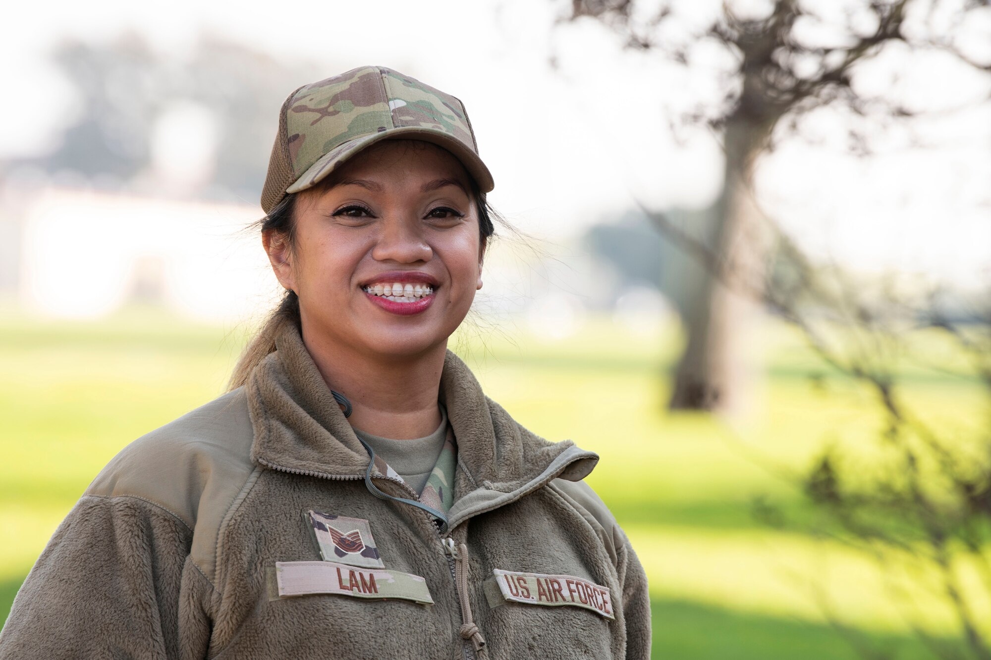 Tech Sgt. Kimmylou Lam, a Cardiopulmonary Technician with the 349th Medical Squadron at Travis Air Force Base, California, poses for a photo prior to departing on a mission supporting COVID-19 relief in New York, Feb. 4, 2022 (U.S. Air Force photo by Grant Okubo)
