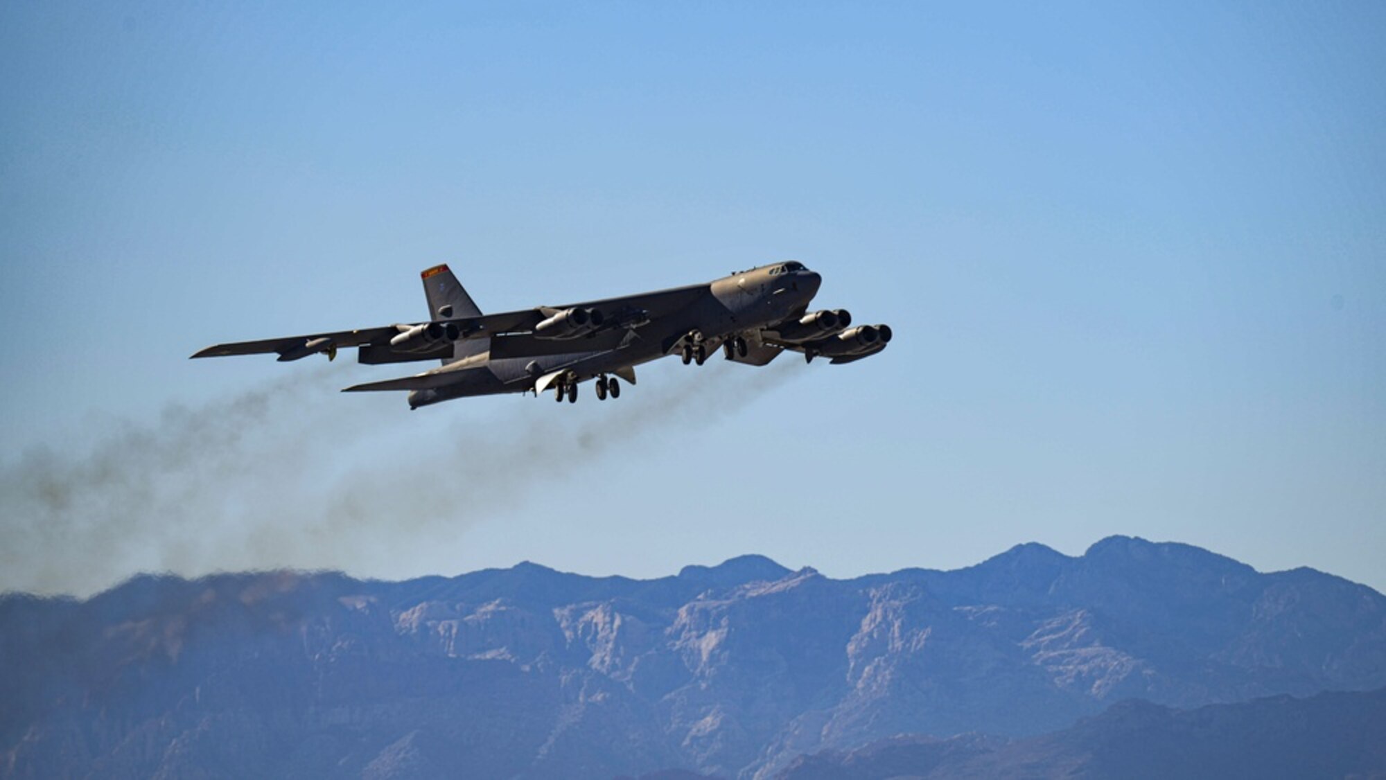 A Minot Air Force Base 5th Bomb Wing B-52H Stratofortress takes off during Red Flag-Nellis 22-1 on Jan. 25, 2022, at Nellis Air Force Base, Nevada. This iteration of Red Flag is focused on confidence under fire, integrated leadership and the warfighter culture. (U.S. Air Force photo by Senior Airman Michael A. Richmond)