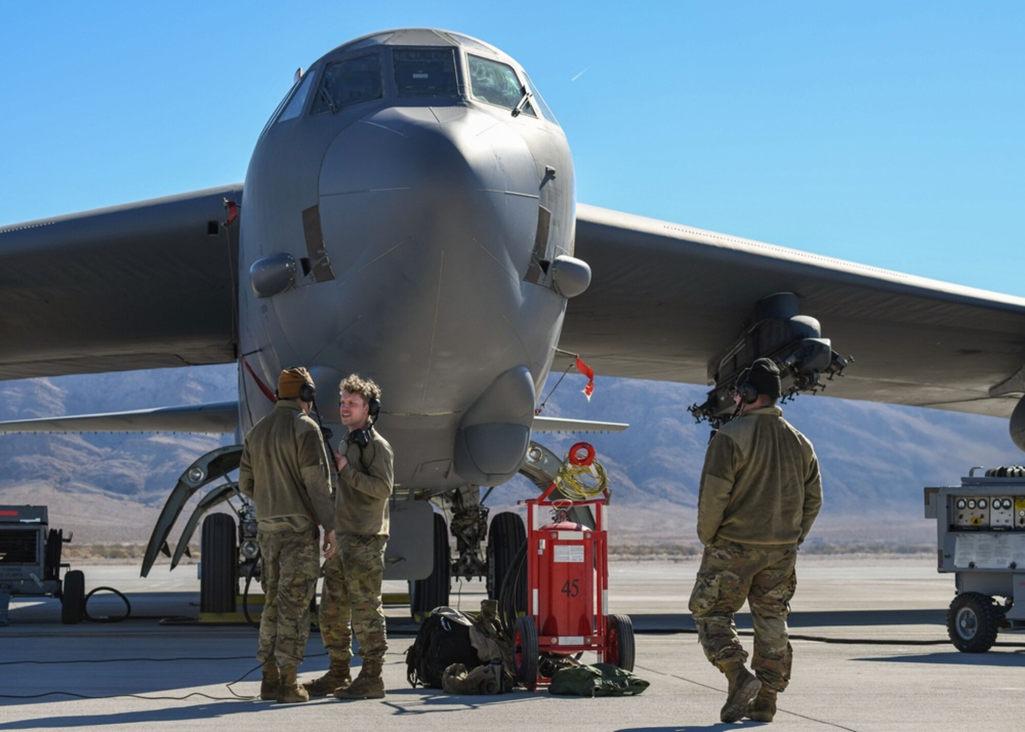 Airmen with the 5th Aircraft Maintenance Squadron perform B-52H Stratofortress preflight procedures during Red Flag-Nellis 22-1 on Jan. 26, 2022, at Nellis Air Force Base, Nevada. The 5 AMXS is one of 32 units from across the U.S. joint forces, United Kingdom (Royal Air Force) and Australia (Royal Australian Air Force) participating in Red Flag-Nellis 22-1. (U.S. Air Force photo by Senior Airman Michael A. Richmond)