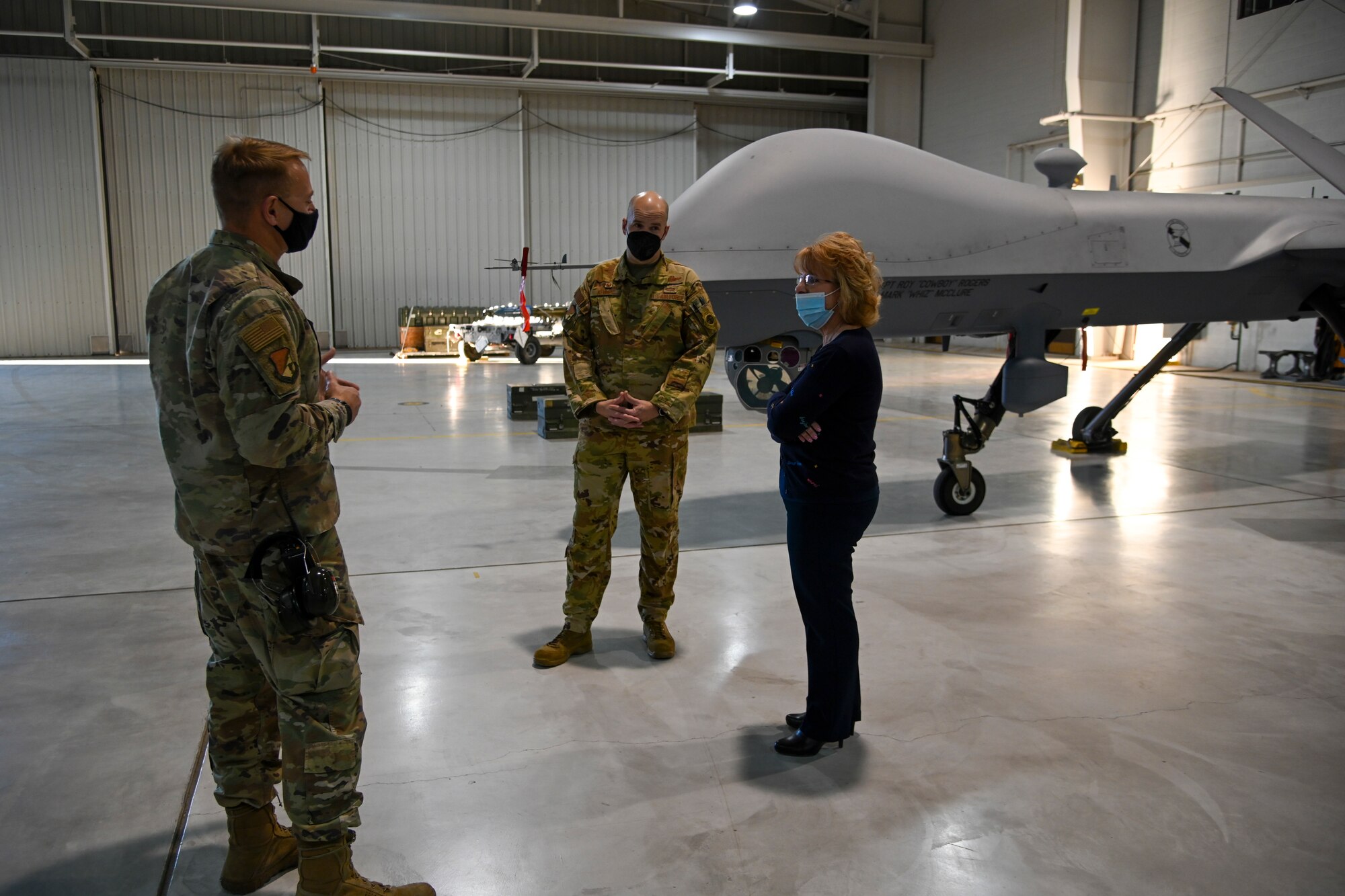 Col. Thomas Preston, 49th Maintenance Group commander, gives Susan Payne, mayor of Alamogordo, New Mexico, and Col. Ryan Keeney, 49th Wing commander, a tour of a 49th MXG hangar, Feb. 7, 2021, on Holloman Air Force Base, New Mexico. During the visit, Payne was also familiarized with the 49th Medical Group, on-base schools and Soaring Heights Communities. (U.S. Air Force photo by Airman 1st Class Jessica Sanchez-Chen)
