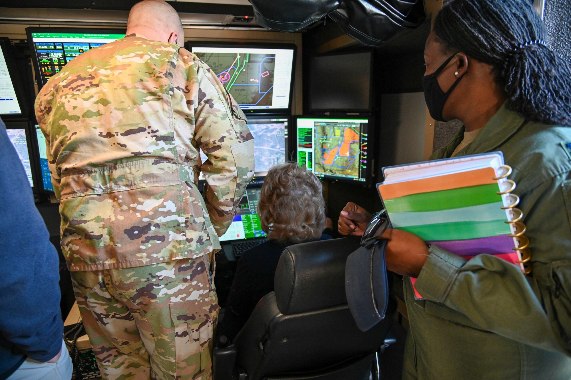 Susan Payne, mayor of Alamogordo, New Mexico, visits the 49th Operations Group MQ-9 cockpit yard, Feb. 7, 2022, on Holloman Air Force Base, New Mexico. Payne was able to operate the sensor operator equipment of a flying MQ-9 Reaper. (U.S. Air Force photo by Airman 1st Class Jessica Sanchez-Chen)