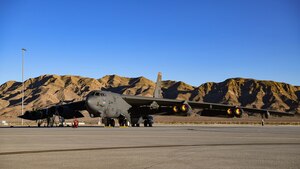 A Minot Air Force Base 5th Bomb Wing B-52H Stratofortress parked on the runway during Red Flag-Nellis 22-1 on Jan. 25, 2022, at Nellis Air Force Base, Nevada. Red Flag-Nellis 22-1 provides realistic combat training that saves lives by increasing combat effectiveness. (U.S. Air Force photo by Senior Airman Michael A. Richmond)