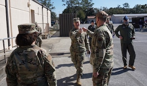 Photo of USAF Gen Kelly shaking civilian's hand