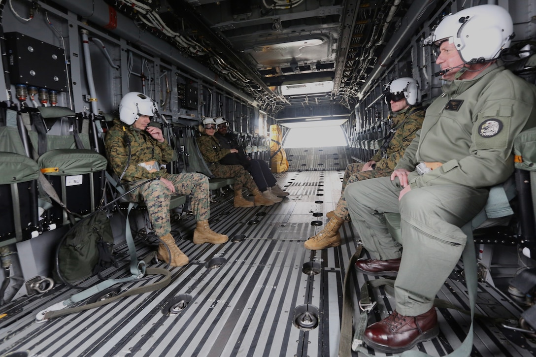 The 38th Commandant of the Marine Corps, Gen. David H. Berger and 19th Sergeant Major of the Marine Corps, Troy E. Black, ride in a CH-53K with VMX-1 Commanding Officer Col Byron D. Sullivan, Marine Corps Air Station New River, NC., March 17, 2021. The purpose of the visit was to receive a hands-on demonstration of the unique heavy-lift capability the CH-53K provides to the Marine Corps and Joint Force as part of development for the future force. (U.S. Marine Corps photo by Sgt. Kathryn Adams)