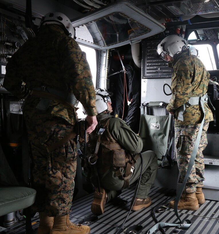The 38th Commandant of the Marine Corps, Gen. David H. Berger and 19th Sergeant Major of the Marine Corps, Troy E. Black, ride in a CH-53K with VMX-1 Commanding Officer Col Byron D. Sullivan, Marine Corps Air Station New River, NC., March 17, 2021. The purpose of the visit was to receive a hands-on demonstration of the unique heavy-lift capability the CH-53K provides to the Marine Corps and Joint Force as part of development for the future force. (U.S. Marine Corps photo by Sgt. Kathryn Adams)