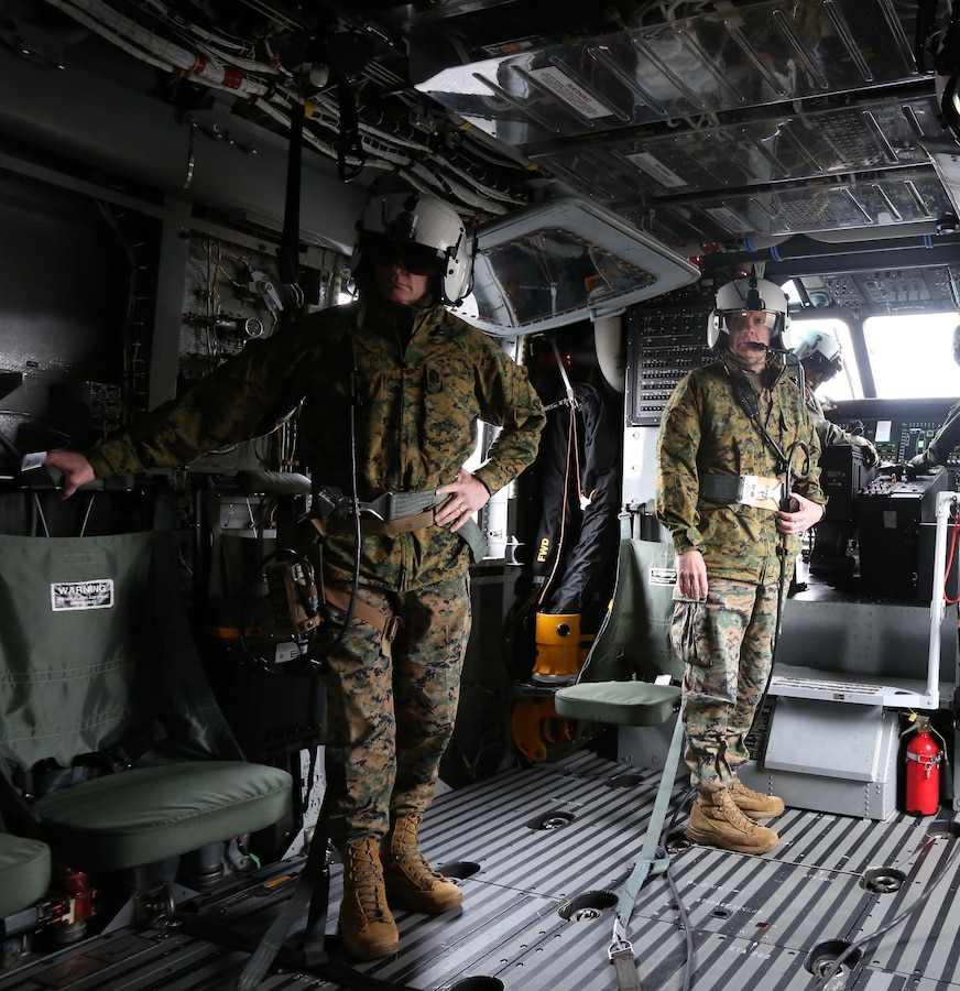 The 38th Commandant of the Marine Corps, Gen. David H. Berger and 19th Sergeant Major of the Marine Corps, Troy E. Black, ride in a CH-53K with VMX-1 Commanding Officer Col Byron D. Sullivan, Marine Corps Air Station New River, NC., March 17, 2021. The purpose of the visit was to receive a hands-on demonstration of the unique heavy-lift capability the CH-53K provides to the Marine Corps and Joint Force as part of development for the future force. (U.S. Marine Corps photo by Sgt. Kathryn Adams)