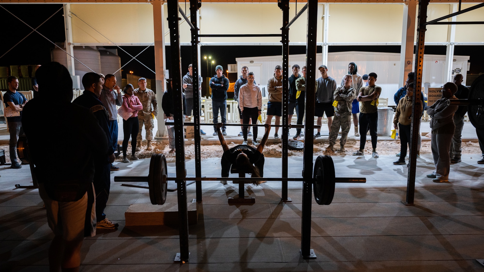 U.S. Army Sgt. Lacey Warner, 378th Expeditionary Medical Group physical therapy technician, demonstrates proper lifting technique at a Healthy Habits Training class at Prince Sultan Air Base, Kingdom of Saudi Arabia, Dec. 17, 2021. Routinely offering base wide classes, PSAB's physical therapy team covers the basics of building a healthy workout regimen, from maintaining proper form and technique to building a comprehensive plan. (U.S. Air Force photo by Senior Airman Jacob B. Wrightsman)