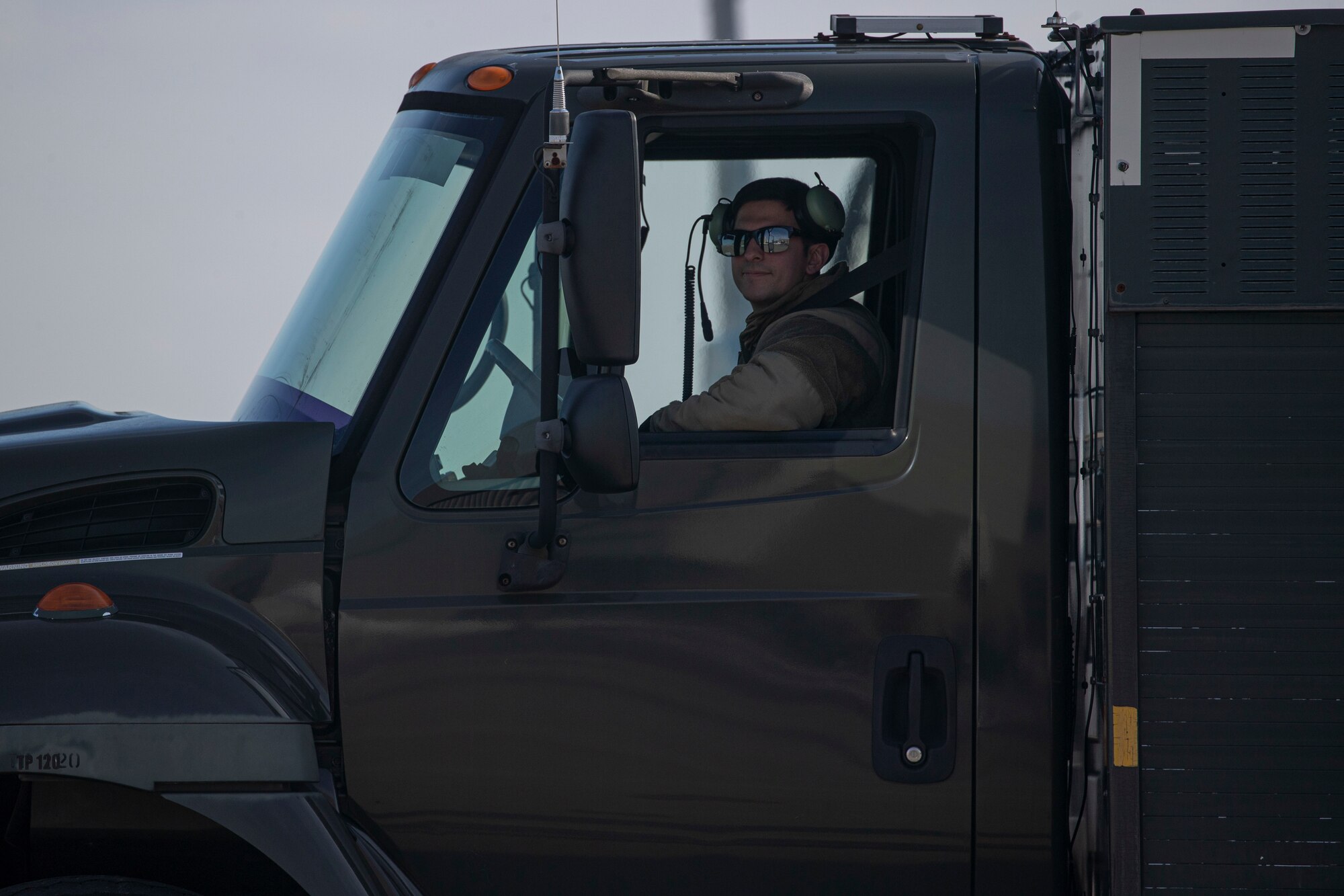 A U.S. Air Force Airman with the 108th Wing prepares to refuel aircraft during an Agile Combat Employment (ACE) demonstration on Joint Base McGuire-Dix-Lakehurst, N.J., Feb. 1, 2022. The New Jersey Air National Guard's 177th Fighter Wing and 108th Wing recently validated ACE capabilities in partnership with the Puerto Rico Air National Guard's 156th Wing to showcase their ability operate in a remote location with a small contingence of Airman to recover, turn and launch airpower capabilities. (U.S. Air National Guard photo by Master Sgt. Matt Hecht)
