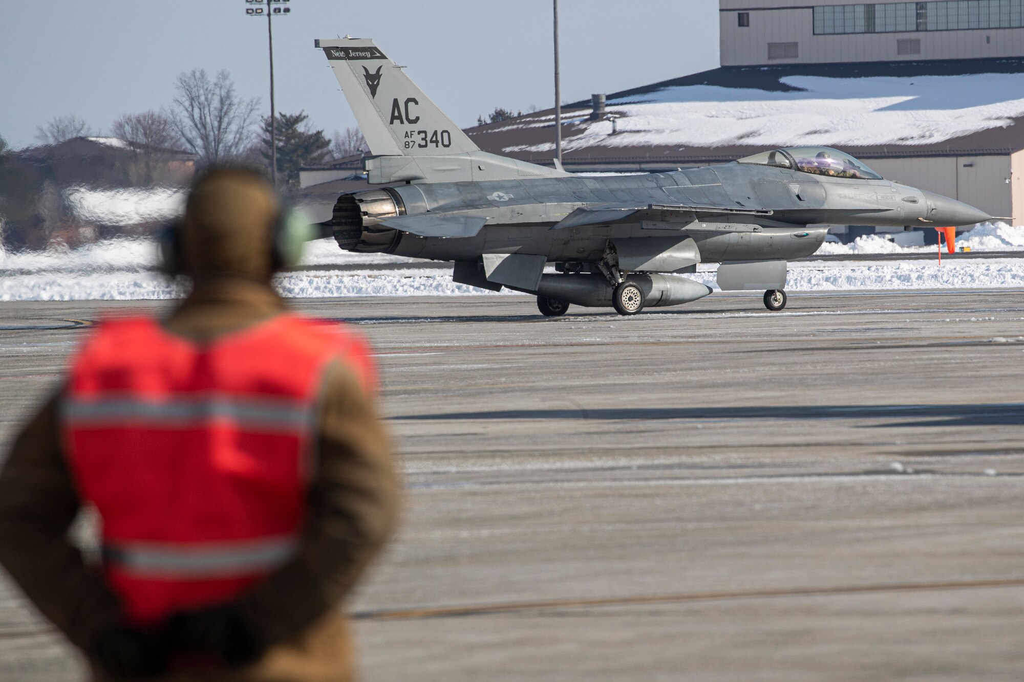 New Jersey Air National Guard Airmen take part in an Agile Combat Employment (ACE) demonstration on Joint Base McGuire-Dix-Lakehurst, N.J., Feb. 1, 2022. The New Jersey Air National Guard's 177th Fighter Wing and 108th Wing recently validated ACE capabilities in partnership with the Puerto Rico Air National Guard's 156th Wing to showcase their ability operate in a remote location with a small contingence of Airman to recover, turn and launch airpower capabilities. (U.S. Air National Guard photo by Master Sgt. Matt Hecht)