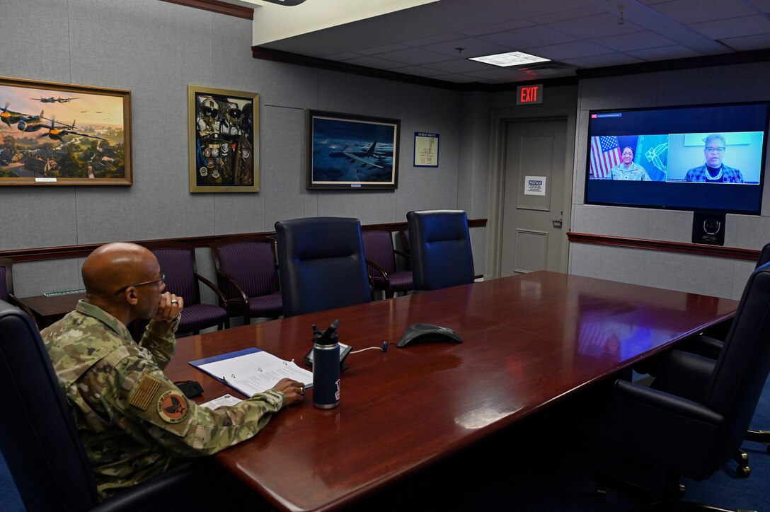 Air Force Chief of Staff Gen. CQ Brown, Jr. listens to remarks from Wanda T. Jones-Heath, right, principal cyber advisor for the Department of the Air Force, during a livestreamed event at the Pentagon celebrating Black History Month, in Arlington, Va., Feb. 9, 2022. The event featured Airman and Guardian stories and a tribute to Brig. Gen. Charles McGee, a Tuskegee Airman who died Jan. 16, 2022. (U.S. Air Force photo by Eric Dietrich)
