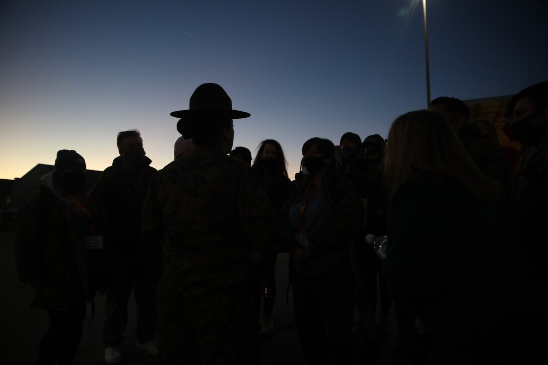 Educators from across Louisiana are being briefed by Staff Sgt. Evelyn Espinal during an Educators Workshop aboard Marine Corps Recruit Depot Parris Island, S.C., January 12, 2022. Marine Corps Recruiting Command provides educators workshops as an opportunity for teachers, principals, counselors, coaches and media to experience the basic training process first-hand. The workshops are one of many ways for the attendees to learn about the multitude of opportunities the Marine Corps can provide to young men and women within their communities. (U.S. Marine Corps photo by Sgt. Danielle Prentice)