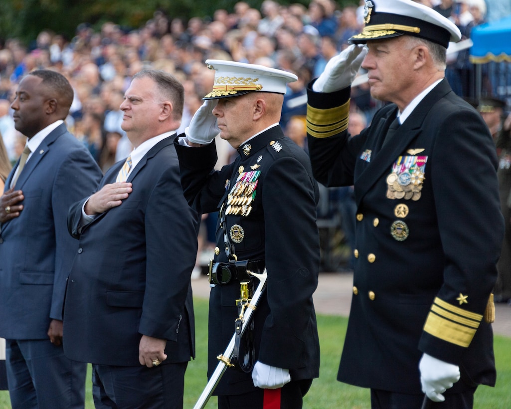 ANNAPOLIS, Md. (Oct. 22, 2021) Gen. David Berger, 38th Commandant of the U.S. Marine Coprs, Vice Adm. Sean Buck, Superintendent of the U. S. Naval Academy, Col. James McDonough III, Commandant of the U.S. Naval Academy, Mr. Robert Barnet, 1991 President, Cmdr. Andre Coleman (Ret.), 1995 President, Ms. Jennifer Tyll, 2001 President, and Lt. Cmdr. Andrienne Maeser, 2006 Incoming President, review the Naval Academy's fifth and final formal parade of the season. Parades are a visual presentation of the military discipline, professionalism and teamwork necessary to succeed as a member of the U.S. Navy and Marine Corps, and have been a part of Naval Academy training since its establishment in 1845. (U.S. Navy photo by Stacy Godfrey/Released)