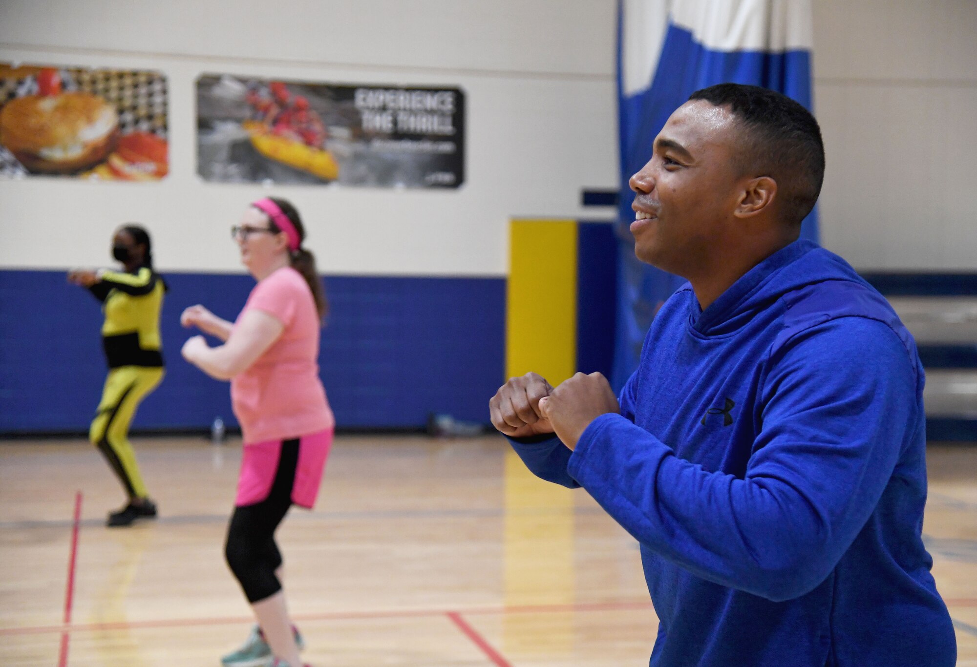 U.S. Air Force Chief Master Sgt. Kodi Bailey, 333rd Training Squadron superintendent, participates in a Zumba Dance Class inside the Blake Fitness Center at Keesler Air Force Base, Mississippi, Feb. 8, 2022. The Black History Month Observance Committee hosted event in celebration of Black History Month, which is celebrated throughout February. This year's theme is Black Health & Wellness. (U.S. Air Force photo by Kemberly Groue)