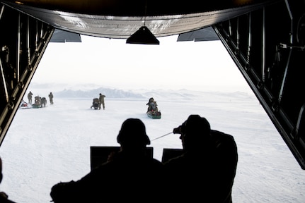 U.S. Special Operation Forces ride snow-machine into a U.S. Air Force C-130 during Arctic Edge 18 March. 8, 2018, in Utqiagvik Alaska. Arctic Edge 2018 is a biennial, large-scale, joint-training exercise that prepares and tests the U.S. military’s ability to operate tactically in the extreme cold-weather conditions found in Arctic environments. Under the authority of the North American Aerospace Defense and U.S. Northern Command, more than 1500 participants from the Air Force, Army, Coast Guard, Marine Corps, and Navy will utilize the unique and expansive air and ground training areas in Alaska. (U.S. Air Force photo by Airman 1st Class Isaac Johnson)
