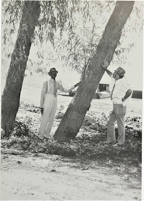 Sam Tucker, hero of 1927 tragedy, shows an author a willow tree, as willow trees evolved out of the last willow mat placements. Photo was taken at a Tennessee chute in 1972.