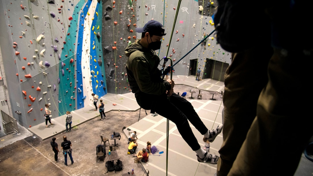 Wounded, ill and injured service members and veterans participate in a rock climbing class at Sport Rock in Alexandria, Virginia on January 23, 2022.