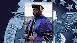 Black man stands outside in college graduation attire.