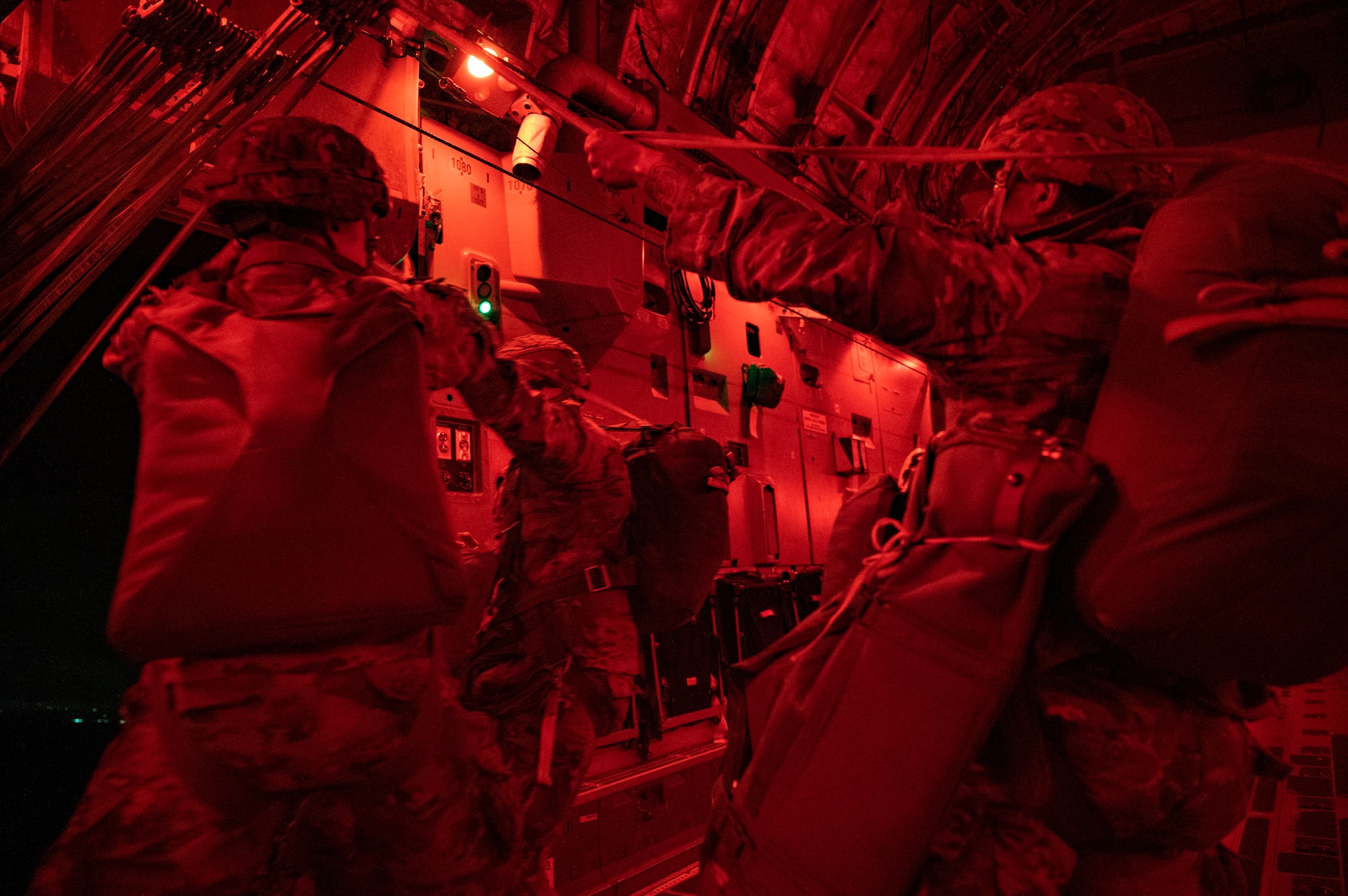 U.S. Army Soldiers assigned to the 82nd Airborne Division, Fort Bragg, North Carolina, exit a C-17 Globemaster III during Battalion Mass Tactical Week at Pope Army Airfield, North Carolina, Feb. 4, 2022. BMTW is a joint exercise between the U.S. Air Force and U.S. Army, which gives participants the ability to practice contingency operations in a controlled environment. (U.S. Air Force photo by Airman 1st Class Charles Casner)