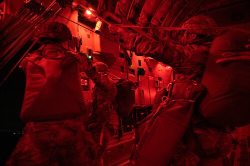 U.S. Army Soldiers assigned to the 82nd Airborne Division, Fort Bragg, North Carolina, exit a C-17 Globemaster III during Battalion Mass Tactical Week at Pope Army Airfield, North Carolina, Feb. 4, 2022. BMTW is a joint exercise between the U.S. Air Force and U.S. Army, which gives participants the ability to practice contingency operations in a controlled environment. (U.S. Air Force photo by Airman 1st Class Charles Casner)