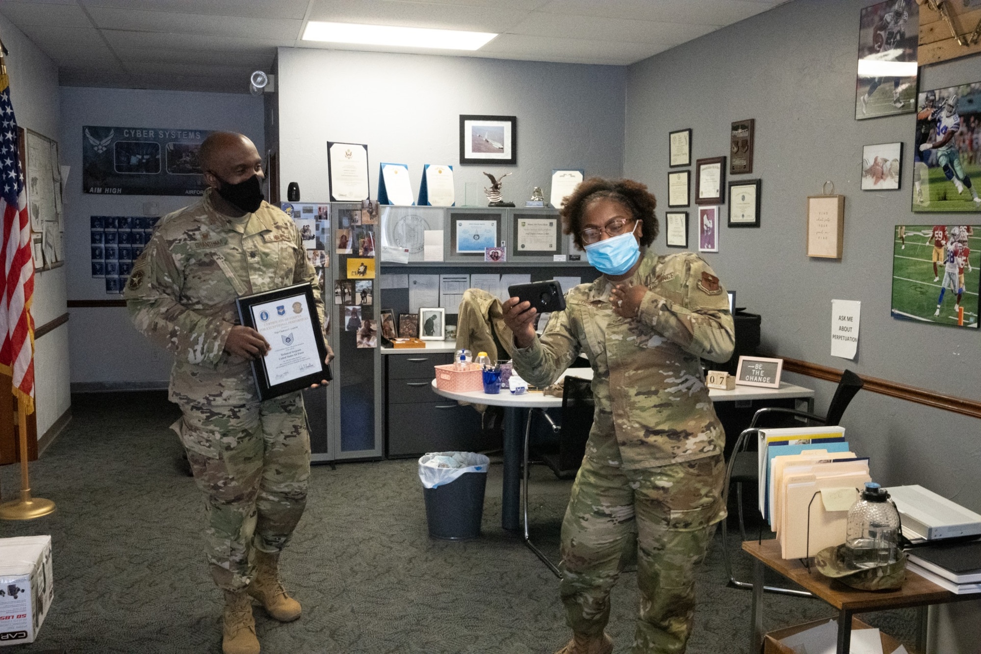 Airmen couple earn STEP promotion
