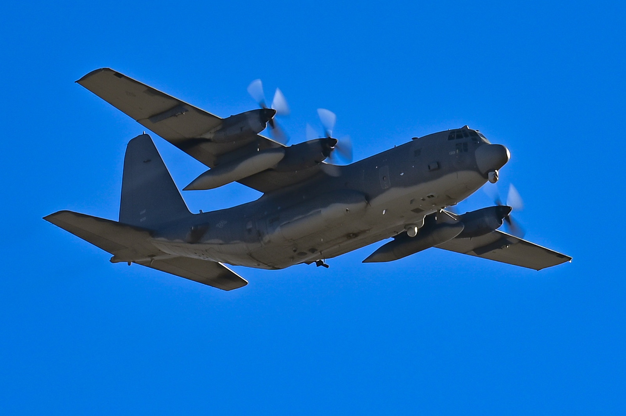 An AC-130 Stinger II gunship assigned to the 16th Special Operations Squadron conducts a flyover of Cannon Air Force Base, New Mexico, Jan. 31, 2022. The flyover was conducted in remembrace of Spirit 03, an AC-130H Spectre gunship assigned to the 16 SOS that was shot down during Operation Desert Storm. (U.S. Air Force photo by Staff Sgt. Maxwell J. Daigle)