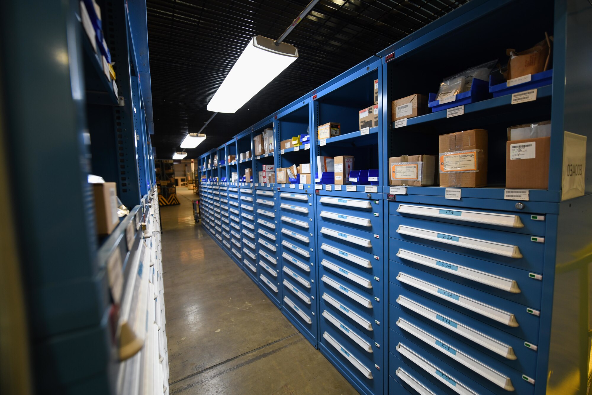 Shelves hold boxes in the Military Personnel Flight building on F.E. Warren Air Force Base, Wyoming, Feb. 9, 2022. The 90 LRS Material Management Flight must inspect incoming boxes to ensure they have received the correct assets and quantities. These assets are distributed throughout F.E. Warren AFB to support the mission of strategic nuclear deterrence. (U.S. Air Force photo by Airman 1st Class Charles Munoz)