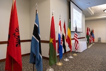 Flags representing all the countries who participated in this year’s Building Partner Aviation Capacity Seminar 22A are displayed Jan. 24, 2022, at Hurlburt Field, Florida.
