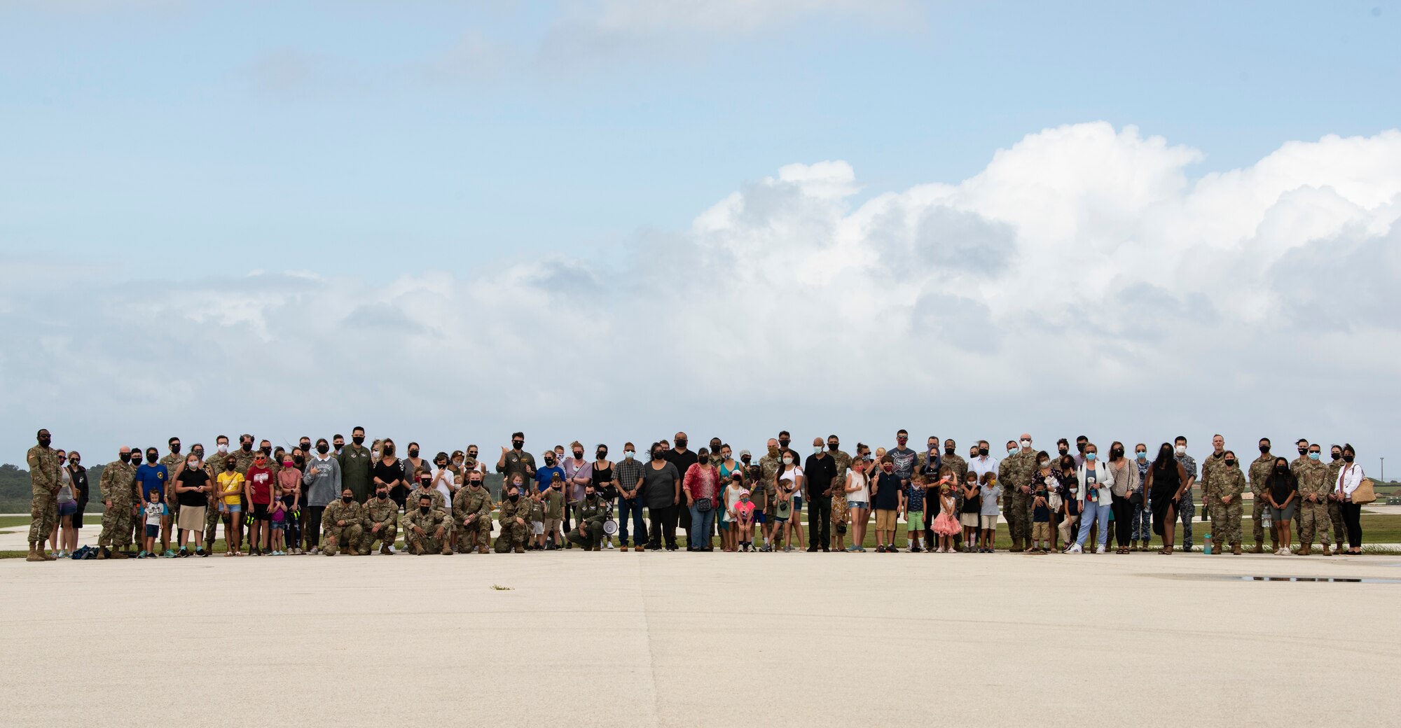 Spectators from the local community as well as Team Andersen stand on the flight line during a take-off viewing day for exercise Cope North 22, Feb. 9, 2022. Service members, their families and civic leaders were invited to the flight line to learn the importance of Cope North while observing aircraft capabilities.  Exercise Cope North is the U.S. Pacific Air Forces’ largest multilateral exercise and includes more than 2, 500 U.S. Airmen, Marines, and Sailors working alongside 1,000 combined Japan Air Self-Defense Force and Royal Australian Air Force counterparts.