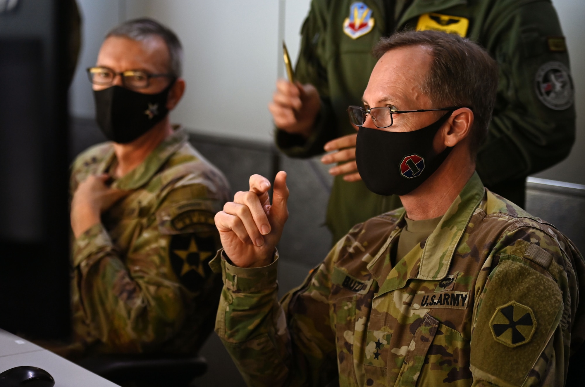 Army Maj. Gen. David A. Lesperance, 2nd Infantry Division-ROK/U.S. Combined commander, and Army Maj. Gen. Windsor S. Buzza, Eighth Army Chief of Staff, take part in dynamic targeting training at the 607th Air Operations Center as part of Airpower Immersion Day February 10, 2022, on Osan Air Base, Republic of Korea. Also on the Airpower Immersion Day itinerary was a hands-on F-16 missile load and an opportunity to utilize A-10 and F-16 dynamic targeting simulators. (U.S. Air Force photo by Master Sgt. Rachelle Morris)