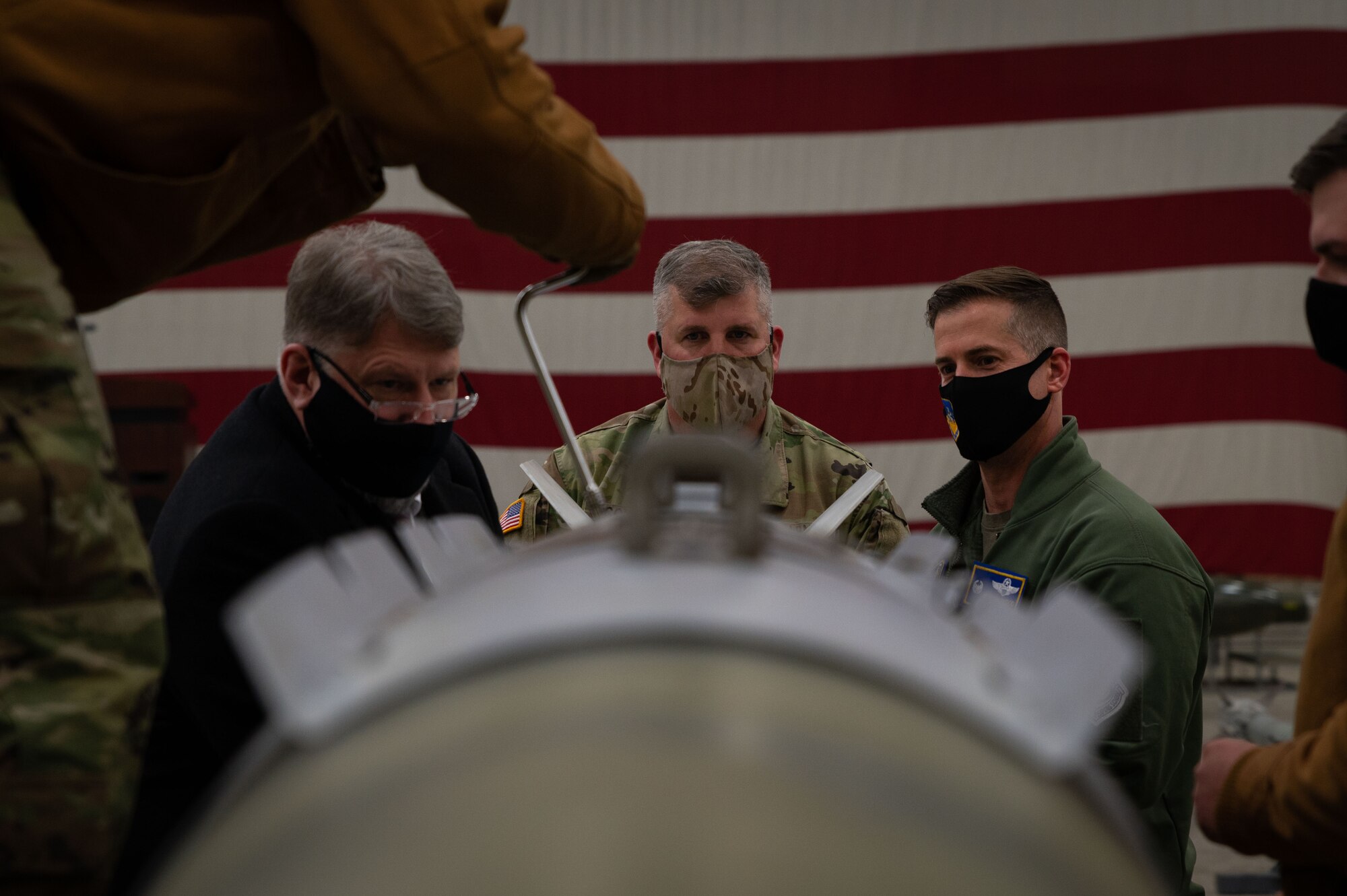 U.S. Army Brig. Gen. Tom O’Connor, Eighth Army deputy commanding general, aids in a bomb assembly during Airpower Immersion Day at Osan Air Base, Republic of Korea, February 10, 2022. He was one of 18 senior leaders stationed across Korea to attend the event. (U.S. Air Force photo by Senior Airman Megan Estrada)