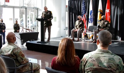 Command Sgt. Maj. John Raines, incoming top senior enlisted member for the Army National Guard, speaks to Army Lt. Gen. Jon Jensen, the director of the Army National Guard, outgoing Command Sgt. Maj. John Sampa and other attendants during a change of responsibility ceremony at the Herbert R. Temple Army National Guard Readiness Center, Arlington, Va., Feb. 9, 2022.