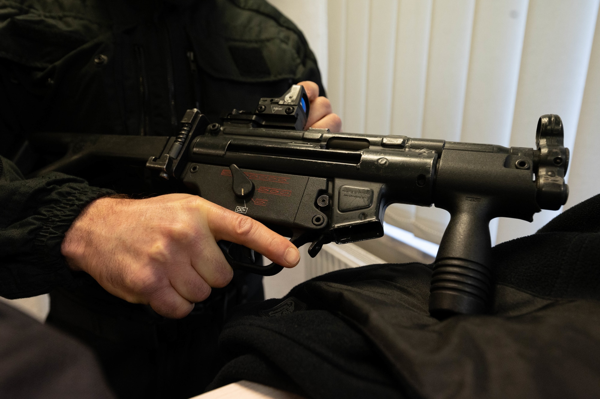 A person holding a weapon.