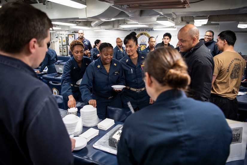 Sailors celebrate.