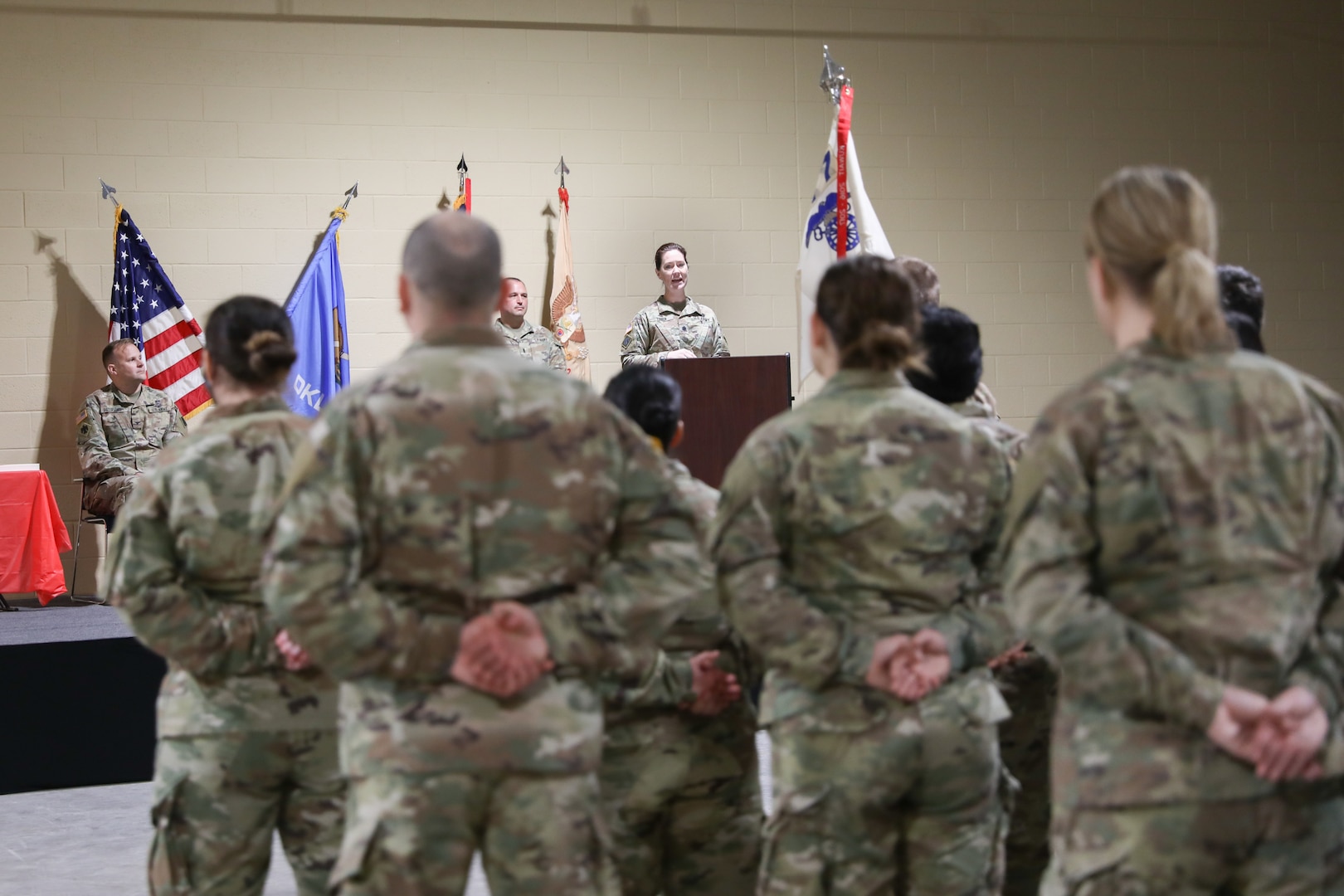 Oklahoma National Guard Lt. Col. Tonia Toben, commander of 345th Combat Sustainment Support Battalion, 90th Troop command, speaks at a ceremony awarding a Meritorious Unit Commendation to Alpha Company 777 at the Armed Forces Readiness Center, Okmulgee, Oklahoma, Feb. 5, 2022. The unit was awarded the commendation in recognition of their accomplishments during their 2016-2017 deployment to Kuwait in support of Operations Inherent Resolve, Spartan Shield, and Freedom’s Sentinel. (Oklahoma National Guard photo by Spc. Danielle Rayon)