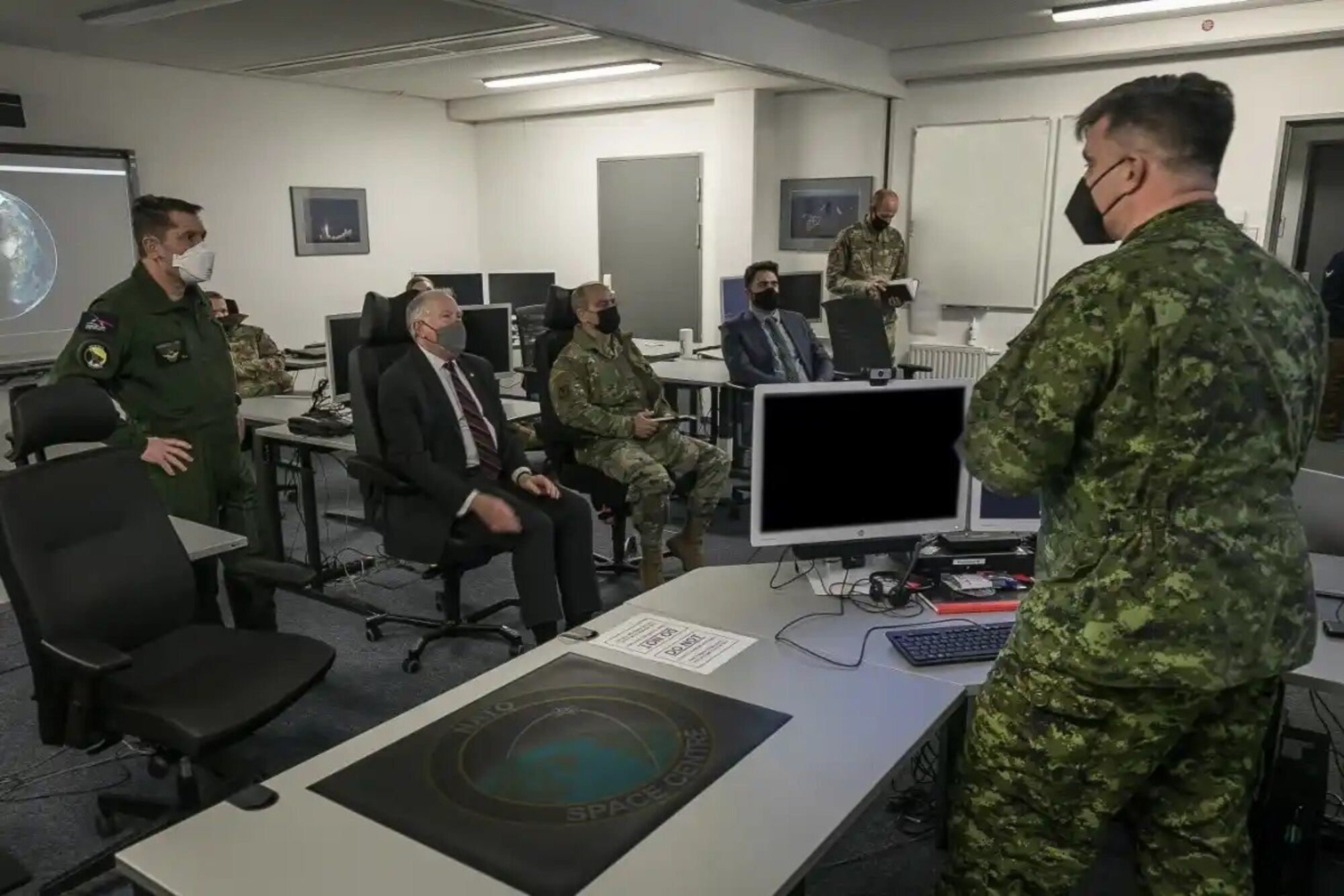 A resentation by Lt Col Paul Arnold (CAN) at the NATO Space Center.