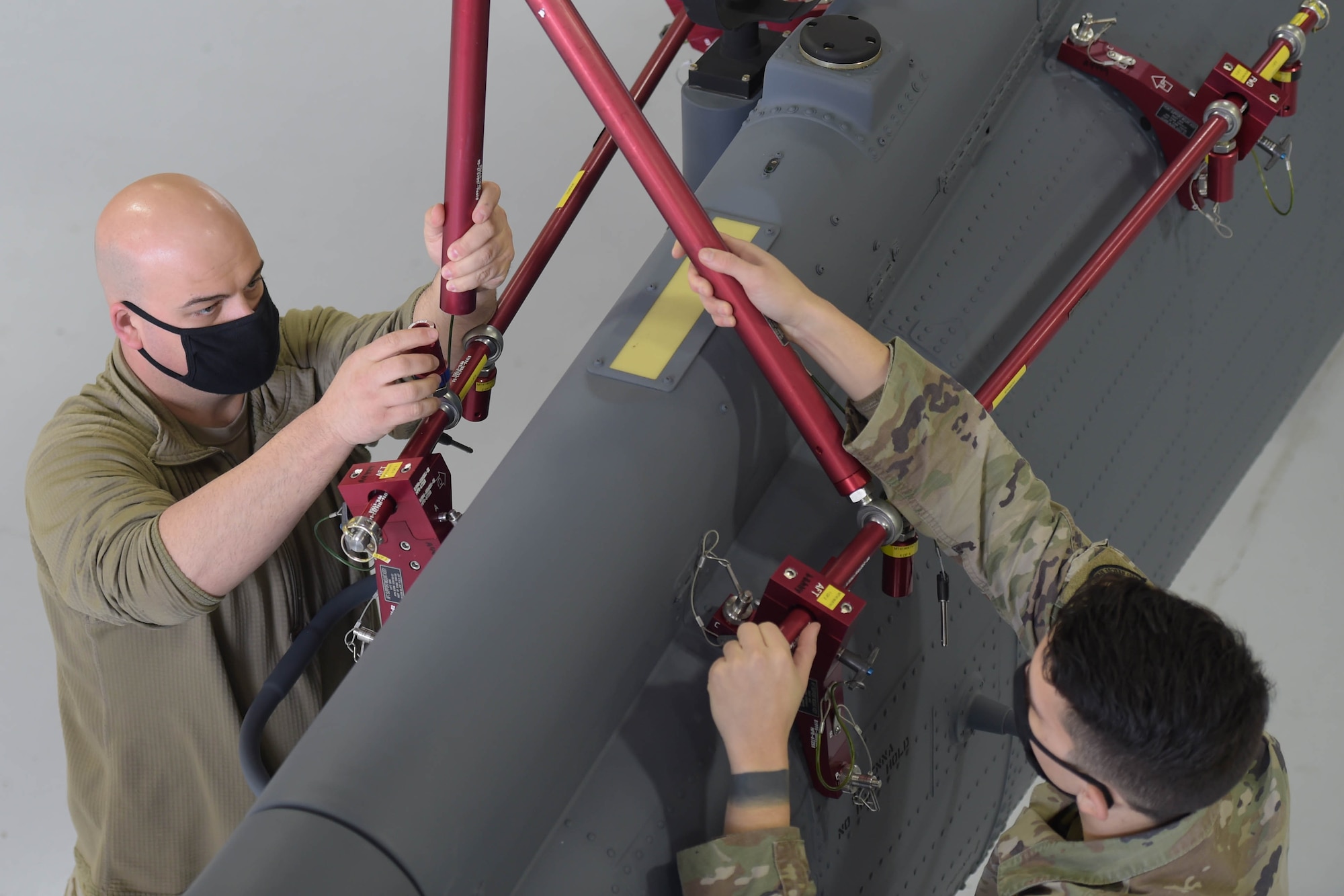 A photo of a group of Airmen working.