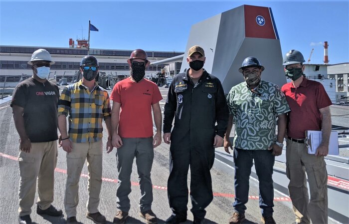 JOINT BASE PEARL HARBOR HICKAM, Hawaii – Aboard the USS William P. Lawrence (DDG-110) from left to right, Ed Beams, ship superintendent, Vigor Marine, Eddie Conti ship superintendent, Vigor Marine, Tom Freeman project manager, Vigor Marine, Cmdr. Kevin McKormick, commanding officer, USS William P. Lawrence, Harry Herrera, project manager, HRMC, Cory Wagner, project manager, HRMC. (Official U.S. Navy photo by Lt. j.g. Jacob Jones, systems test officer and ship’s material maintenance officer)