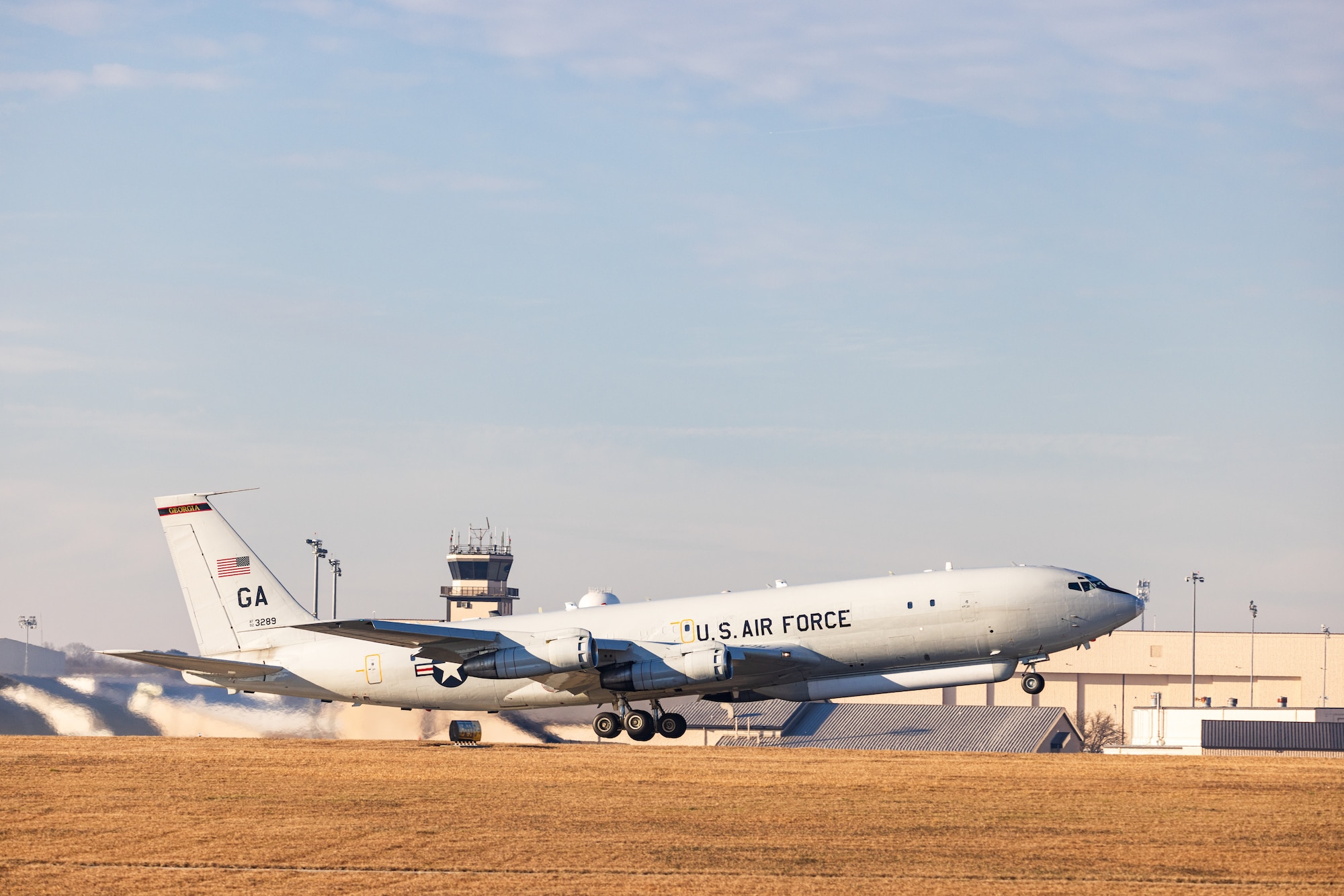 E-8C Joint STARS aircraft 92-3289 departs one last time from Robins Air Force Base, Georgia, Feb. 11, 2022. The aircraft has been in military service since 1996 and will retire to its final resting place with the 309th Aerospace Maintenance and Regeneration Group at Davis-Monthan Air Force Base, Arizona. (U.S. Air National Guard photo by Tech. Sgt. Jeff Rice)