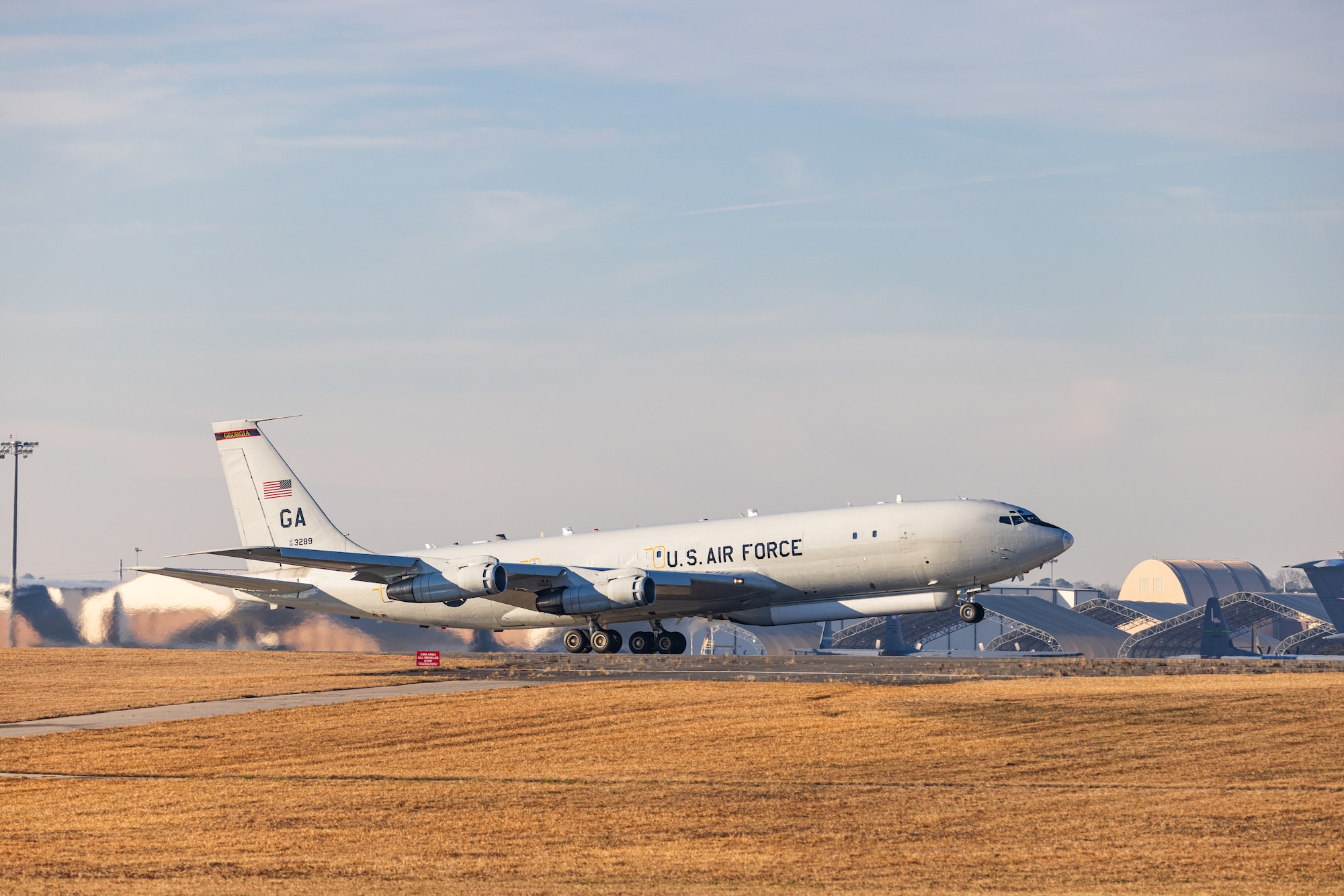 E-8C Joint STARS aircraft 92-3289 departs one last time from Robins Air Force Base, Georgia, Feb. 11, 2022. The aircraft has been in military service since 1996 and will retire to its final resting place with the 309th Aerospace Maintenance and Regeneration Group at Davis-Monthan Air Force Base, Arizona. (U.S. Air National Guard photo by Tech. Sgt. Jeff Rice)